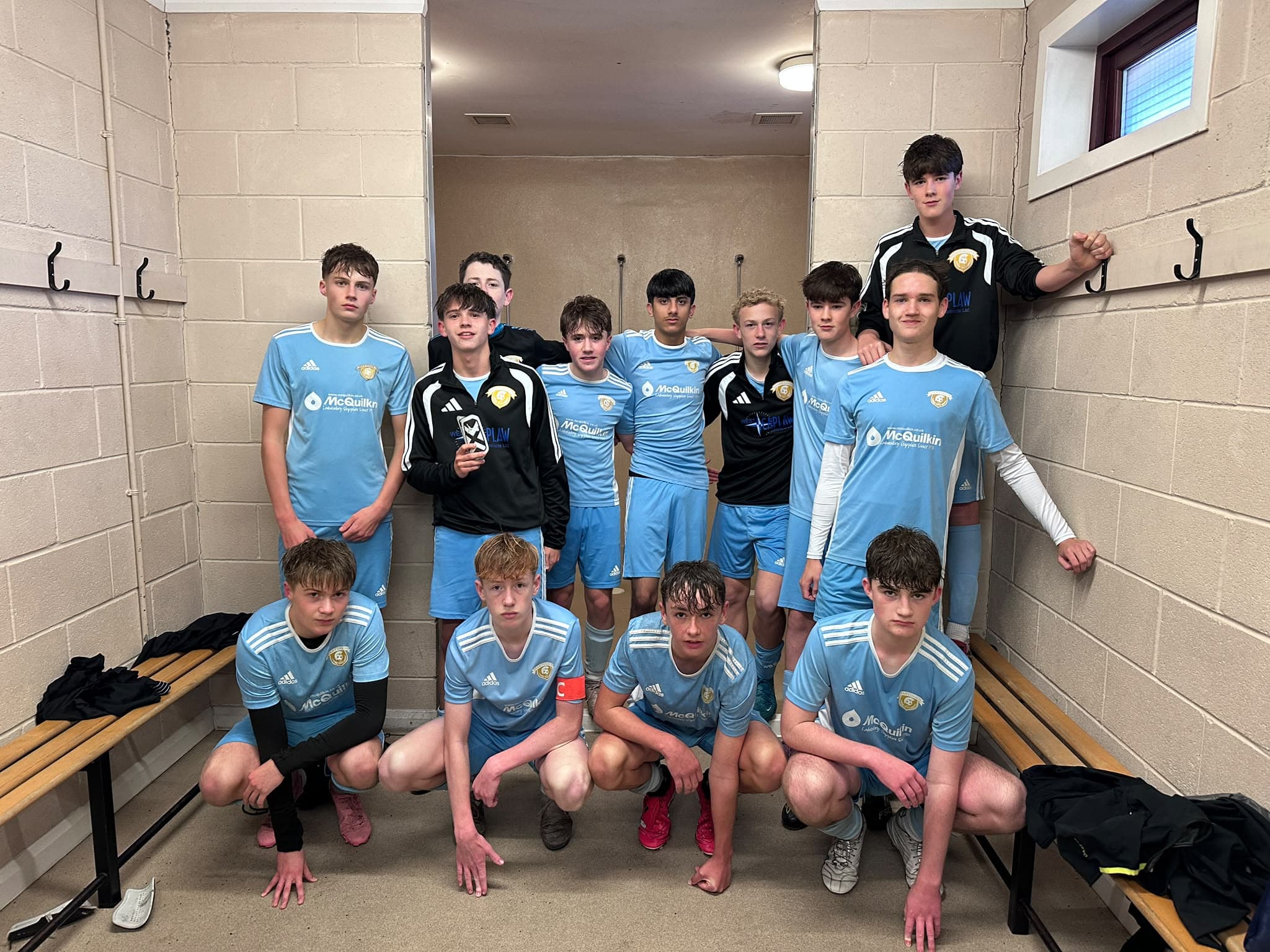 City players together in the changing room after their 10–0 victory